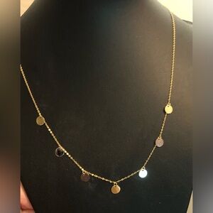 14k yellow chain with multicolor disc hanging from chain